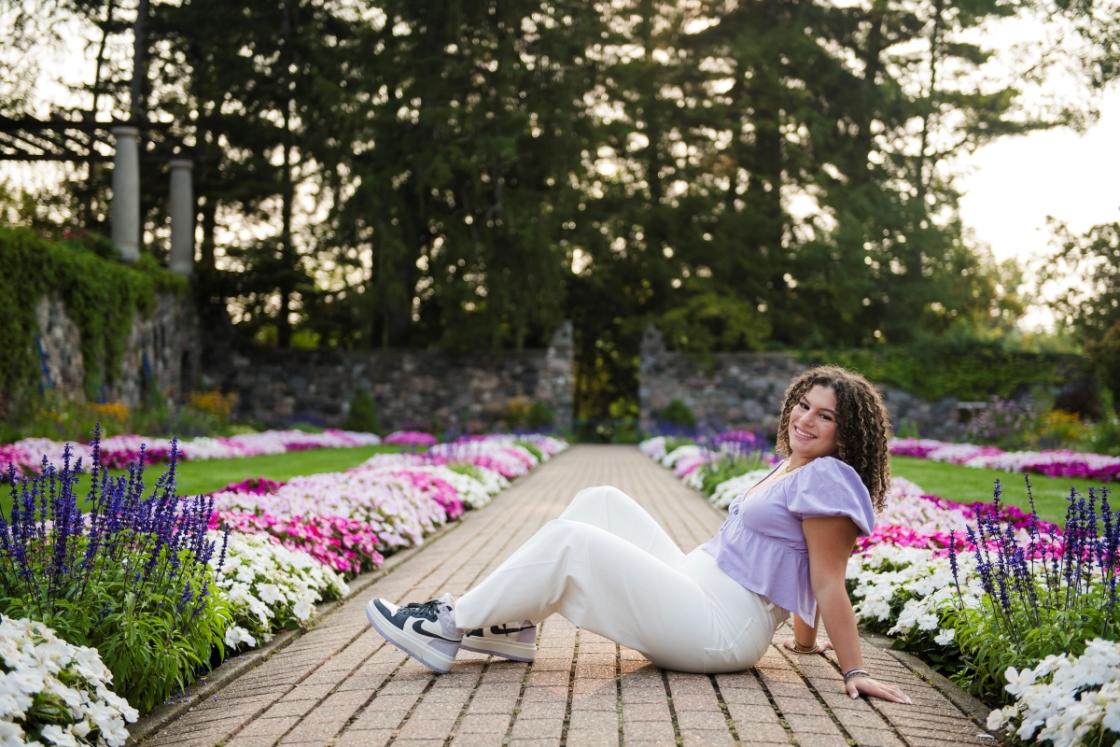 Portrait photograph of a person in the Sunken Garden.