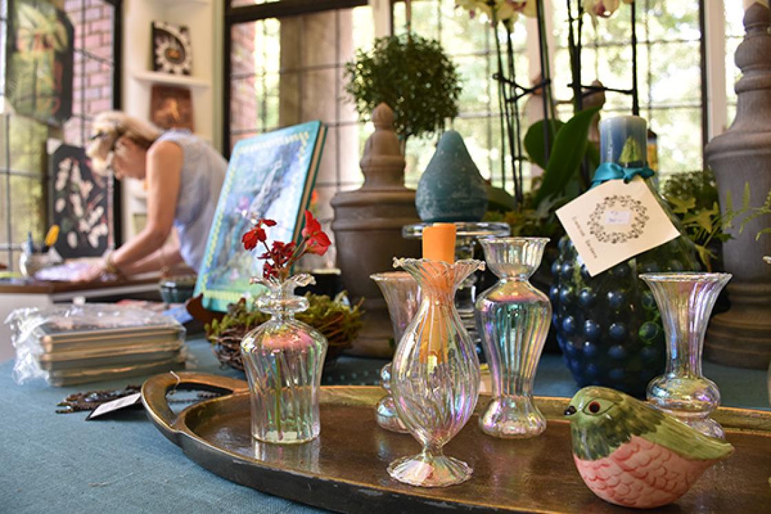 Photograph of the Thistle Gift Shop with a volunteer in the background.